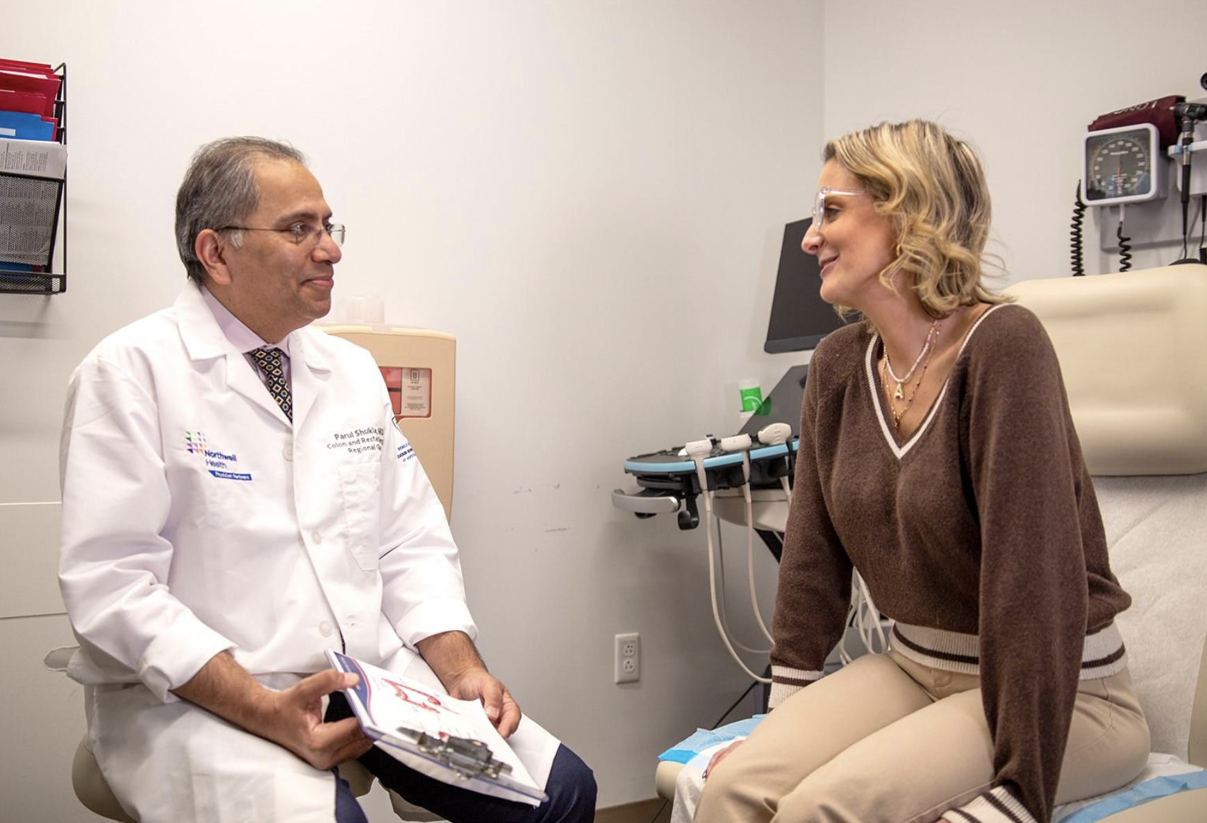 Doctor gives high five to a young patient