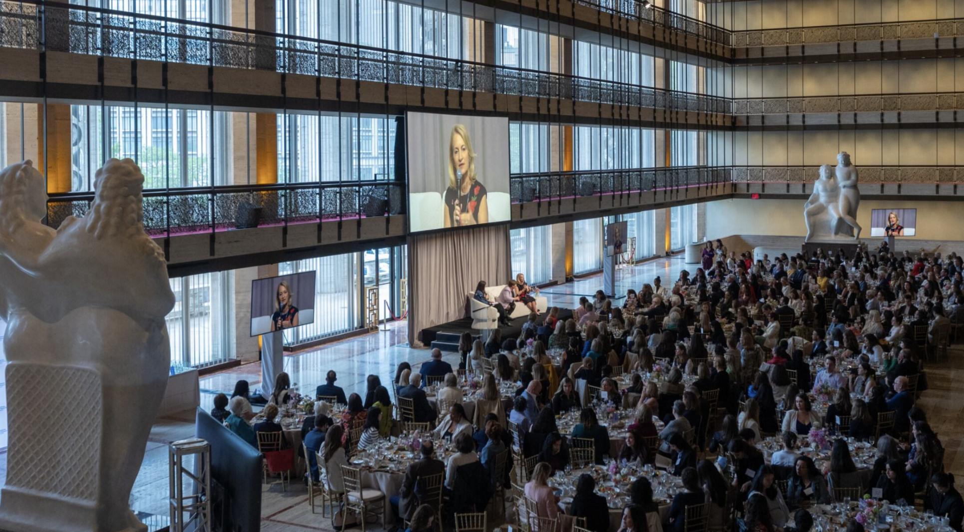 Female researchers reading a book in the lab